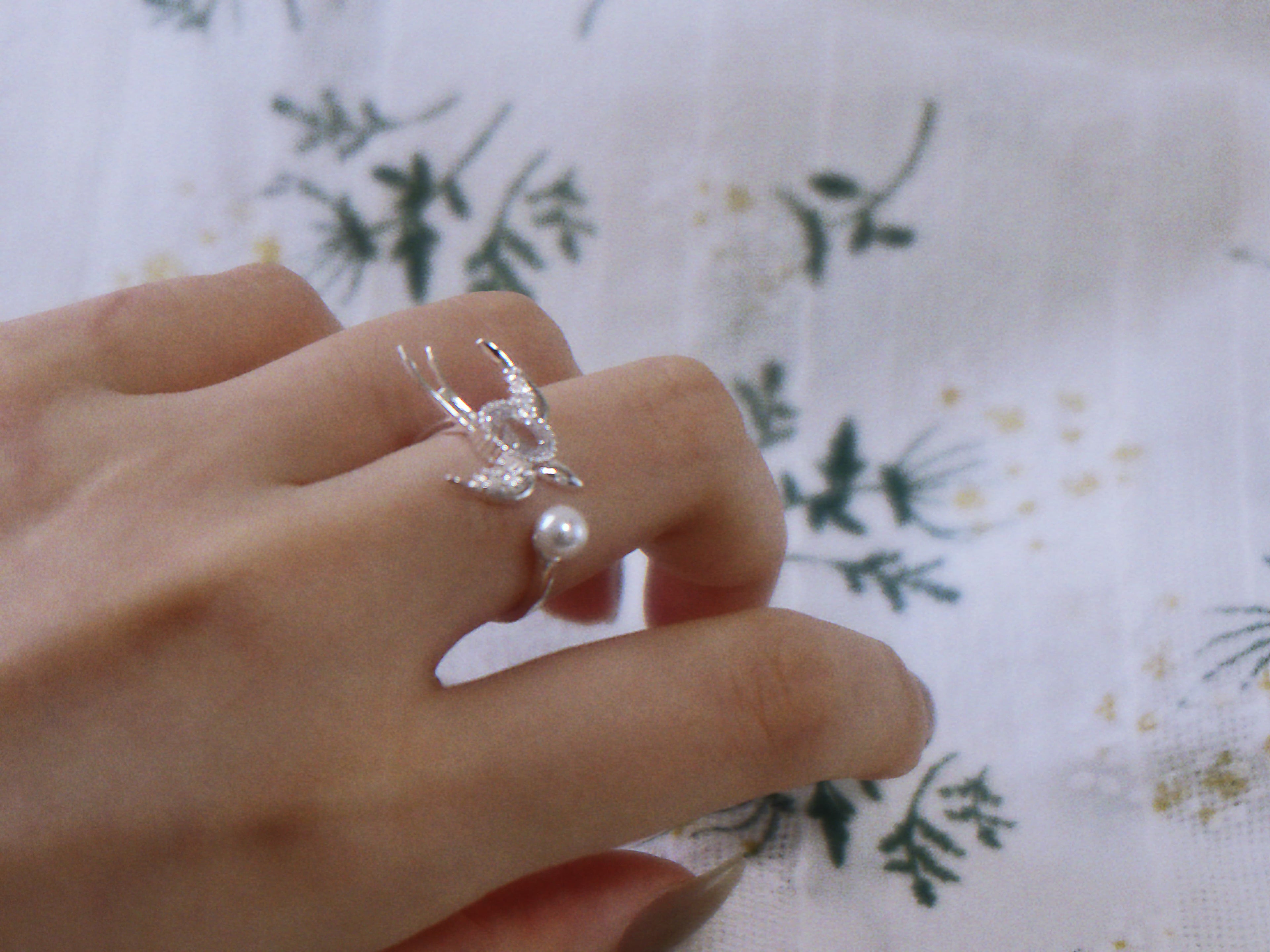 The Messenger. Sterling Silver Winged Swallow Ring with Pearl Accent