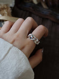 The Boundless Link. Interlocking Chain Geometric Band