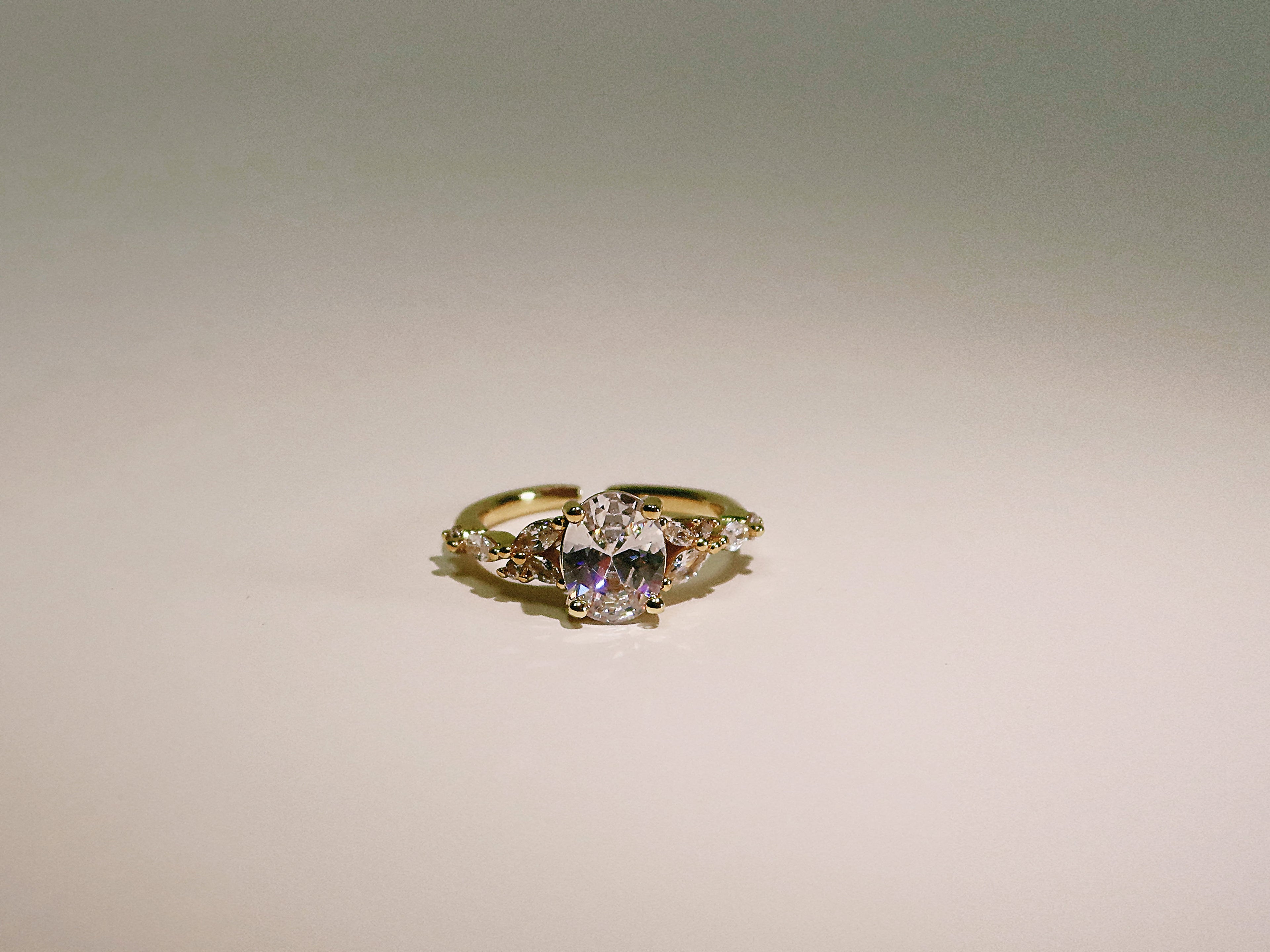 The Sovereign Trinity: The Oculus — Gold Plated Eco-Brass Oval Solitaire Cubic Zirconia Ring