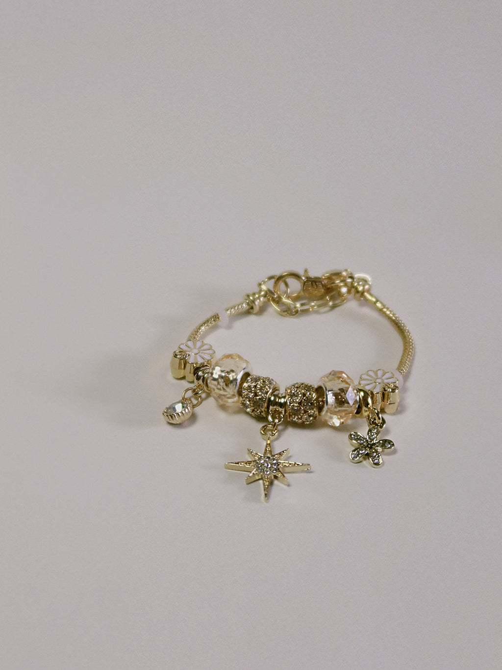 The Eosphorus. Gold Serpent Chain Starburst Bracelet