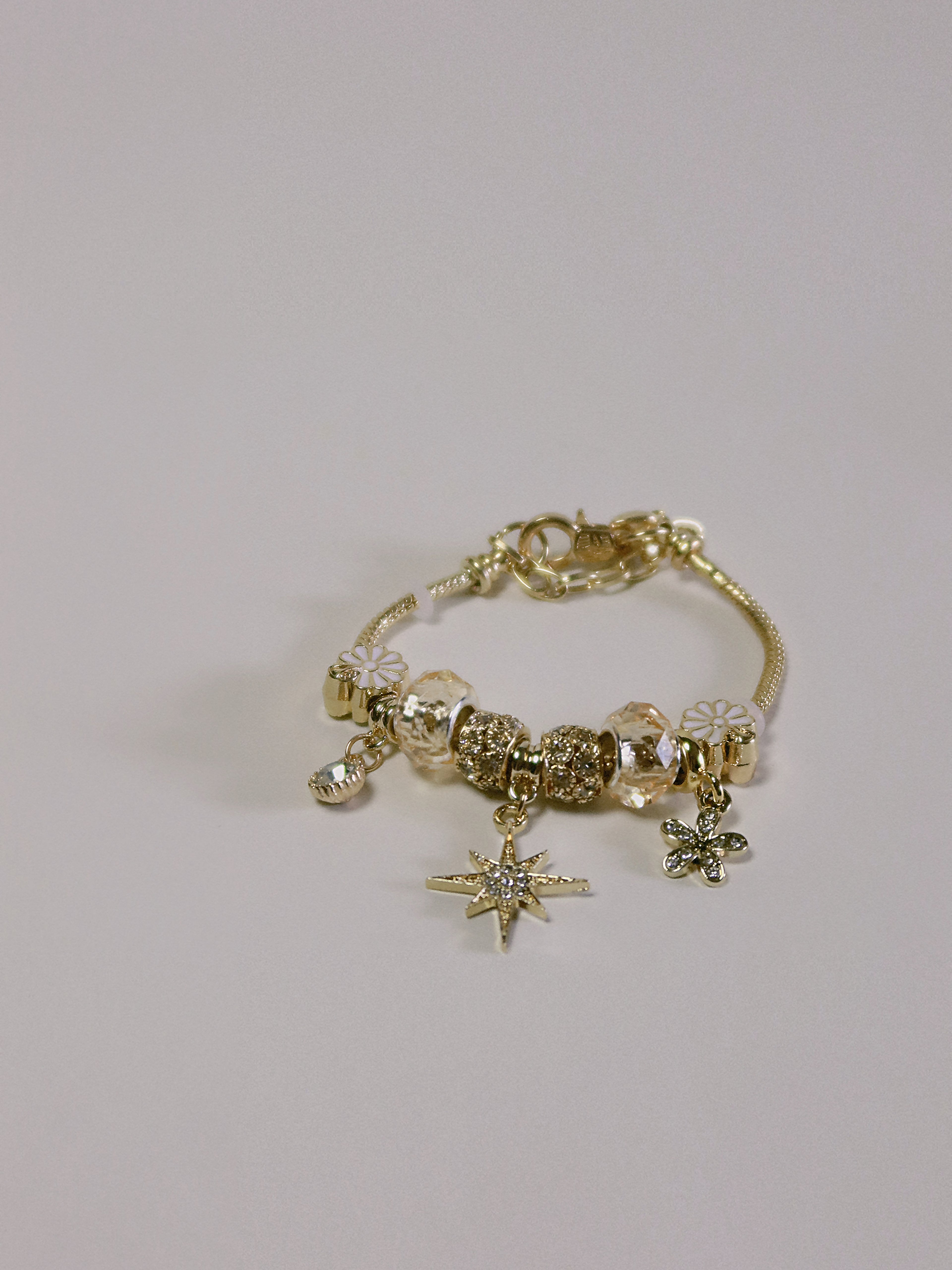 The Eosphorus. Gold Serpent Chain Starburst Bracelet
