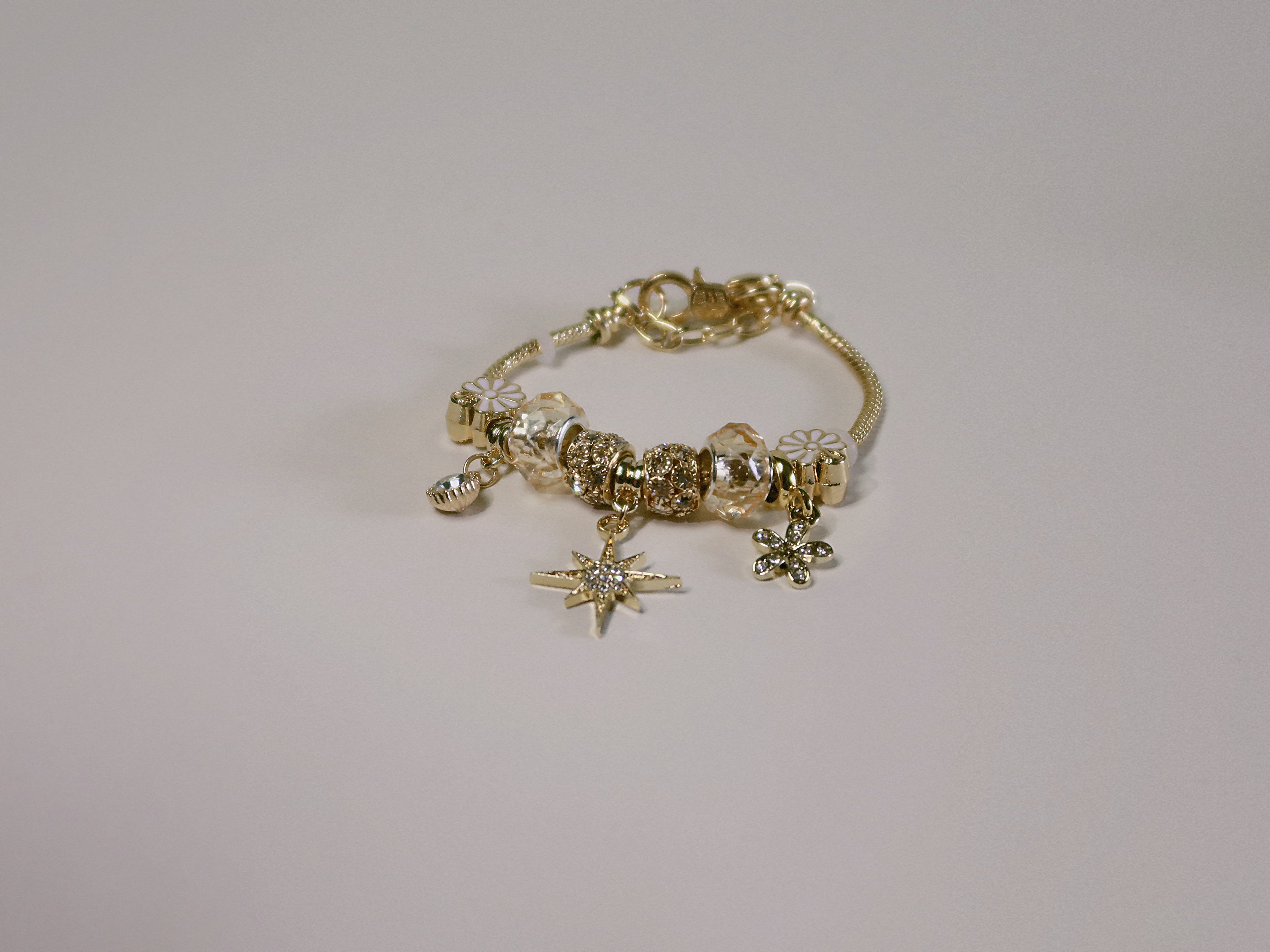 The Eosphorus. Gold Serpent Chain Starburst Bracelet